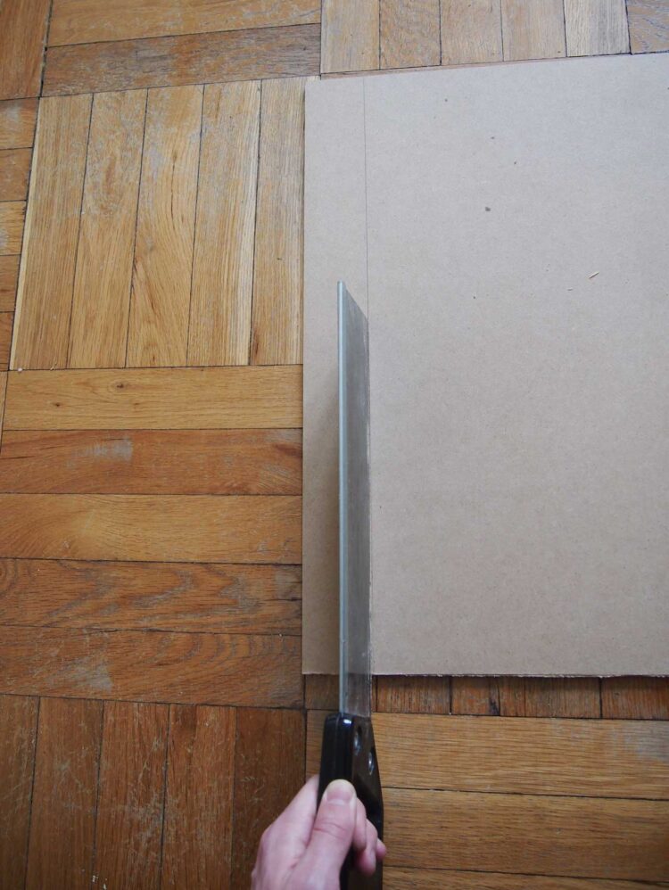 10     With a hand saw, trim your MDF board so it is only 108cm (42.5in) in length.